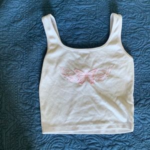 White cropped tank with a butterfly design. Y2K
